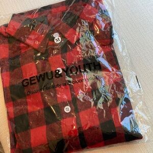 Plaid collared lumber jack style button down shirt size medium unisex